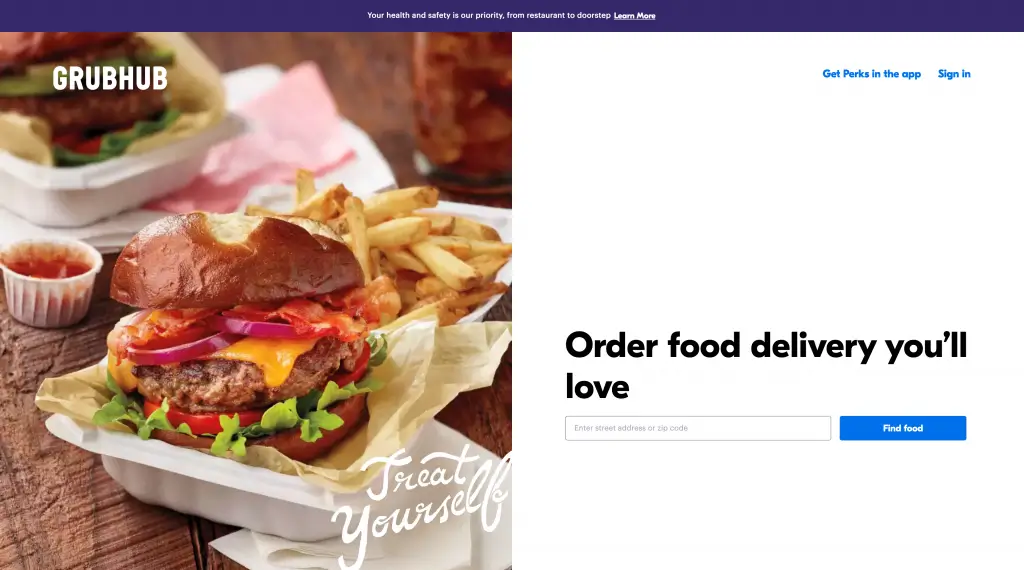 The Grubhub home page, headed Order food delivery you'll love, beside a photograph of a burger and fries
