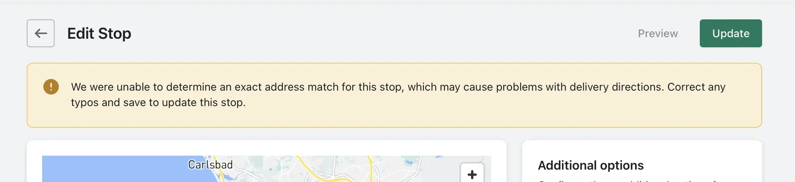 The Edit Stop page with an amber banner saying EasyRoutes could not determine an exact address match and asking to correct any typos