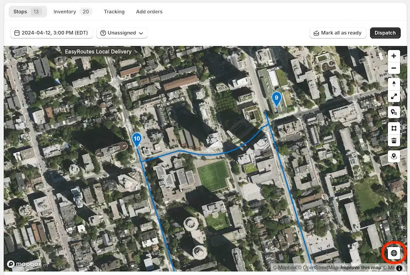 A route drawn over a satellite view of a city, with the map-style toggle highlighted