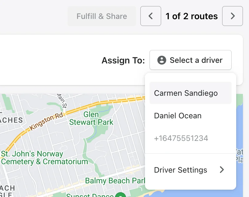 The Assign To drop-down on a route open under “Select a driver”, listing two drivers, a pending phone number and Driver Settings