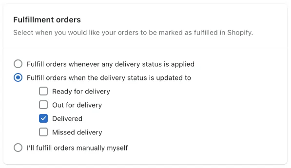 The Fulfillment orders setting set to fulfill orders when the delivery status is updated to Delivered, with a manual fulfillment option below