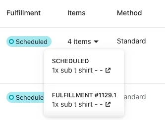 An order row with Fulfillment set to Scheduled and its 4 items dropdown open, splitting the order into a SCHEDULED part and FULFILLMENT #1129.1