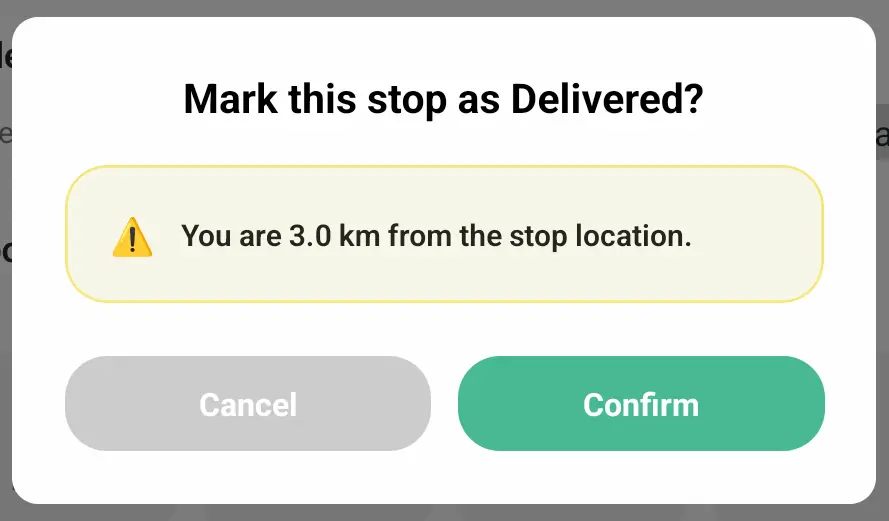 The EasyRoutes driver app’s “Mark this stop as Delivered?” prompt warning “You are 3.0 km from the stop location.” with Cancel and Confirm