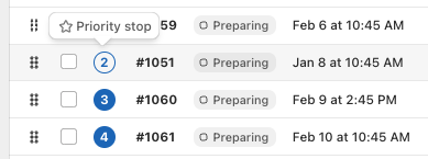 The Route table with stop 2 shown as an outlined number icon and a “Priority stop” tooltip with a star above it