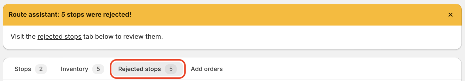 A yellow Route assistant banner saying 5 stops were rejected, above the route tabs with the Rejected stops tab circled in red