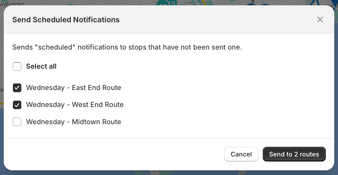 The Send Scheduled Notifications dialog with two of three Wednesday routes ticked and a Send to 2 routes button